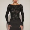 Mini-robe Eirlys en dentelle transparente à encolure bateau, couleur noire