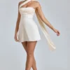 Mini-robe en satin drapée à col dos nu Anastasia, couleur ivoire Mini-robe en satin drapée à col dos nu Anastasia, couleur ivoire