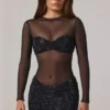Mini-robe à manches longues et col haut Noel, en tulle noir orné Mini-robe à manches longues et col haut Noel, en tulle noir orné