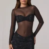 Mini-robe à manches longues et col haut Noel, en tulle noir orné Mini-robe à manches longues et col haut Noel, en tulle noir orné