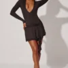Mini-robe à manches longues et décolleté plongeant Vallen, en noir Mini-robe à manches longues et décolleté plongeant Vallen, en noir