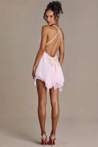 Mini-robe Mariette en mousseline haut de gamme, décolleté plongeant et dos nu, couleur rose pâle