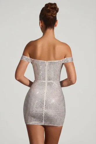 Mini-robe à épaules dénudées Leonora ornée, en blanc