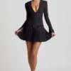 Mini-robe plissée à manches longues Fiorella en noir Mini-robe plissée à manches longues Fiorella en noir
