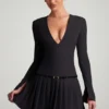 Mini-robe plissée à manches longues Fiorella en noir Mini-robe plissée à manches longues Fiorella en noir