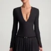Mini-robe plissée à manches longues Fiorella en noir Mini-robe plissée à manches longues Fiorella en noir