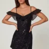 Mini-robe trapèze Jacira à lacets et ornements, en noir Mini-robe trapèze Jacira à lacets et ornements, en noir
