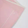 Mini-short Soft Active croisé à contraste, couleur rose poudré Mini-short Soft Active croisé à contraste, couleur rose poudré
