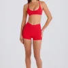Mini-short Soft Active à poche et taille en V, couleur rouge fraise Mini-short Soft Active à poche et taille en V, couleur rouge fraise
