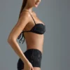 Oh Polly Maillot de bain : Haut de bikini micro orné HOTFIX Edition en noir Oh Polly Maillot de bain : Haut de bikini micro orné HOTFIX Edition en noir