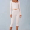 Pantalon capri Selene en maille à taille mi-haute, couleur ivoire Pantalon capri Selene en maille à taille mi-haute, couleur ivoire