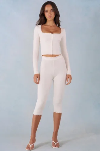 Pantalon capri Selene en maille à taille mi-haute, couleur ivoire