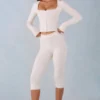 Pantalon capri Selene en maille à taille mi-haute, couleur ivoire Pantalon capri Selene en maille à taille mi-haute, couleur ivoire
