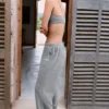 Pantalon de jogging large taille basse en coton texturé à boutons, gris foncé Pantalon de jogging large taille basse en coton texturé à boutons, gris foncé