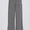 Pantalon de jogging large taille basse en coton texturé à boutons, gris foncé Pantalon de jogging large taille basse en coton texturé à boutons, gris foncé