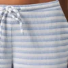 Pantalon taille basse en jersey côtelé à rayures bleues Pantalon taille basse en jersey côtelé à rayures bleues