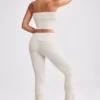 Pantalon évasé à revers en maille épaisse, couleur crème Pantalon évasé à revers en maille épaisse, couleur crème