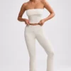 Pantalon évasé à revers en maille épaisse, couleur crème Pantalon évasé à revers en maille épaisse, couleur crème