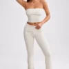 Pantalon évasé à revers en maille épaisse, couleur crème Pantalon évasé à revers en maille épaisse, couleur crème