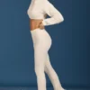 Pantalon évasé à revers en maille torsadée, couleur crème Pantalon évasé à revers en maille torsadée, couleur crème
