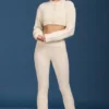 Pantalon évasé à revers en maille torsadée, couleur crème Pantalon évasé à revers en maille torsadée, couleur crème