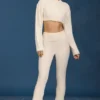 Pantalon évasé à revers en maille torsadée, couleur crème Pantalon évasé à revers en maille torsadée, couleur crème
