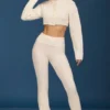 Pantalon évasé à revers en maille torsadée, couleur crème Pantalon évasé à revers en maille torsadée, couleur crème