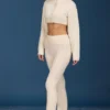 Pantalon évasé à revers en maille torsadée, couleur crème Pantalon évasé à revers en maille torsadée, couleur crème