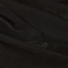 Pantalon évasé taille basse à volants Reese métallisé en noir Pantalon évasé taille basse à volants Reese métallisé en noir