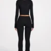 Pantalon évasé taille mi-haute Philippa en modal noir Pantalon évasé taille mi-haute Philippa en modal noir