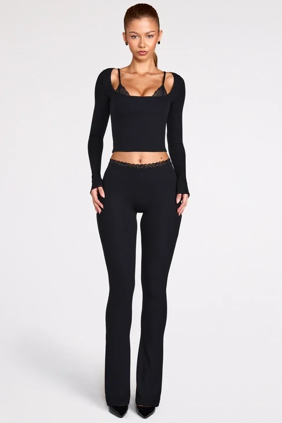 Pantalon évasé taille mi-haute Philippa en modal noir Pantalon évasé taille mi-haute Philippa en modal noir