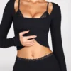 Pantalon évasé taille mi-haute Philippa en modal noir Pantalon évasé taille mi-haute Philippa en modal noir