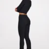 Pantalon évasé taille mi-haute Philippa en modal noir Pantalon évasé taille mi-haute Philippa en modal noir