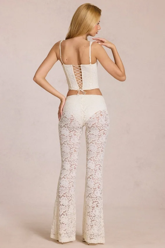 Pantalon évasé taille moyenne en dentelle transparente Calista, couleur ivoire Pantalon évasé taille moyenne en dentelle transparente Calista, couleur ivoire
