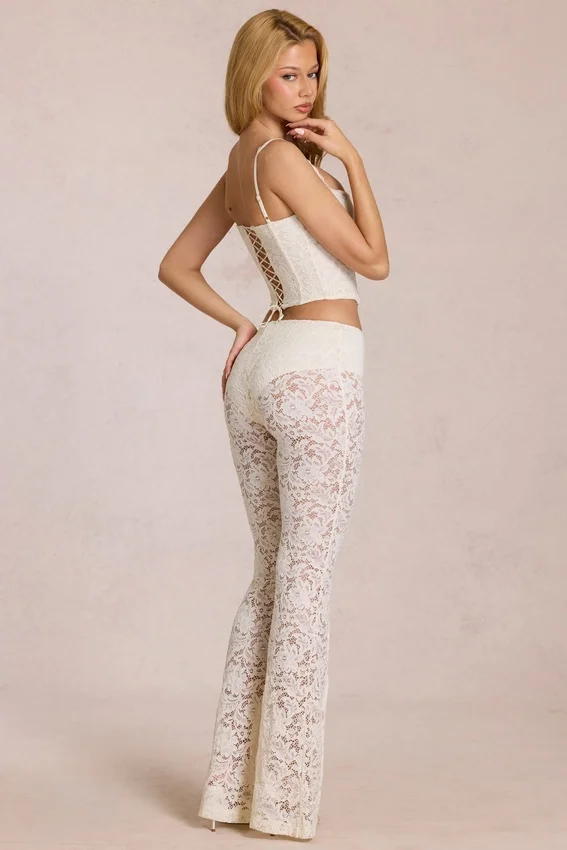 Pantalon évasé taille moyenne en dentelle transparente Calista, couleur ivoire Pantalon évasé taille moyenne en dentelle transparente Calista, couleur ivoire
