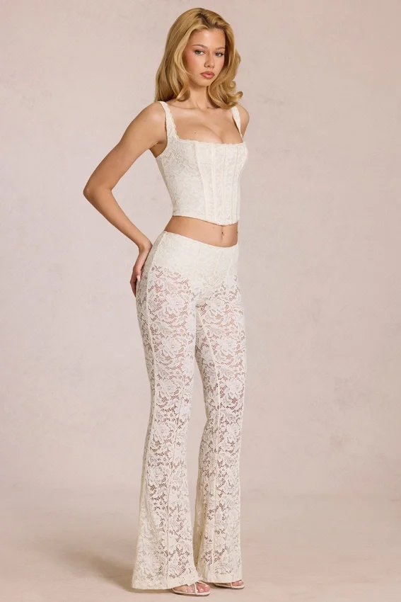 Pantalon évasé taille moyenne en dentelle transparente Calista, couleur ivoire Pantalon évasé taille moyenne en dentelle transparente Calista, couleur ivoire