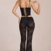 Pantalon évasé taille moyenne en dentelle transparente Calista, noir Pantalon évasé taille moyenne en dentelle transparente Calista, noir