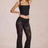 Pantalon évasé taille moyenne en dentelle transparente Calista, noir Pantalon évasé taille moyenne en dentelle transparente Calista, noir