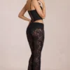 Pantalon évasé taille moyenne en dentelle transparente Calista, noir Pantalon évasé taille moyenne en dentelle transparente Calista, noir