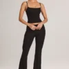 Pantalon évasé taille moyenne Patsy en modal noir Pantalon évasé taille moyenne Patsy en modal noir