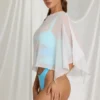 Poncho transparent Zarayah en blanc Poncho transparent Zarayah en blanc