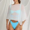 Poncho transparent Zarayah en blanc Poncho transparent Zarayah en blanc