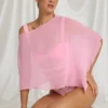 Poncho transparent Zarayah en rose bonbon Poncho transparent Zarayah en rose bonbon