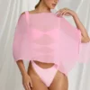 Poncho transparent Zarayah en rose bonbon Poncho transparent Zarayah en rose bonbon