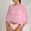 Poncho transparent Zarayah en rose bonbon Poncho transparent Zarayah en rose bonbon