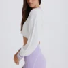 Pull court en coton à mailles torsadées, couleur lilas ivoire Pull court en coton à mailles torsadées, couleur lilas ivoire