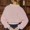 Pull oversize à col en V en jersey de coton rose poudré Pull oversize à col en V en jersey de coton rose poudré