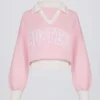 Pull oversize à col en V en jersey de coton rose poudré Pull oversize à col en V en jersey de coton rose poudré