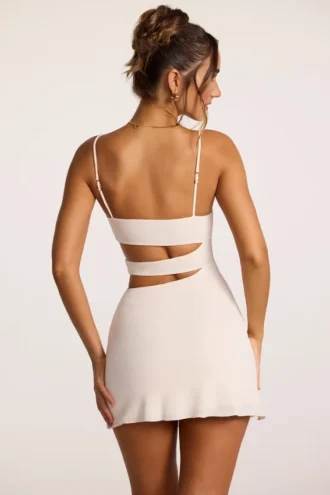 Robe A-line en jersey texturé avec découpes, couleur ivoire, par Azzurra