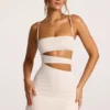 Robe A-line en jersey texturé avec découpes, couleur ivoire, par Azzurra Robe A-line en jersey texturé avec découpes, couleur ivoire, par Azzurra